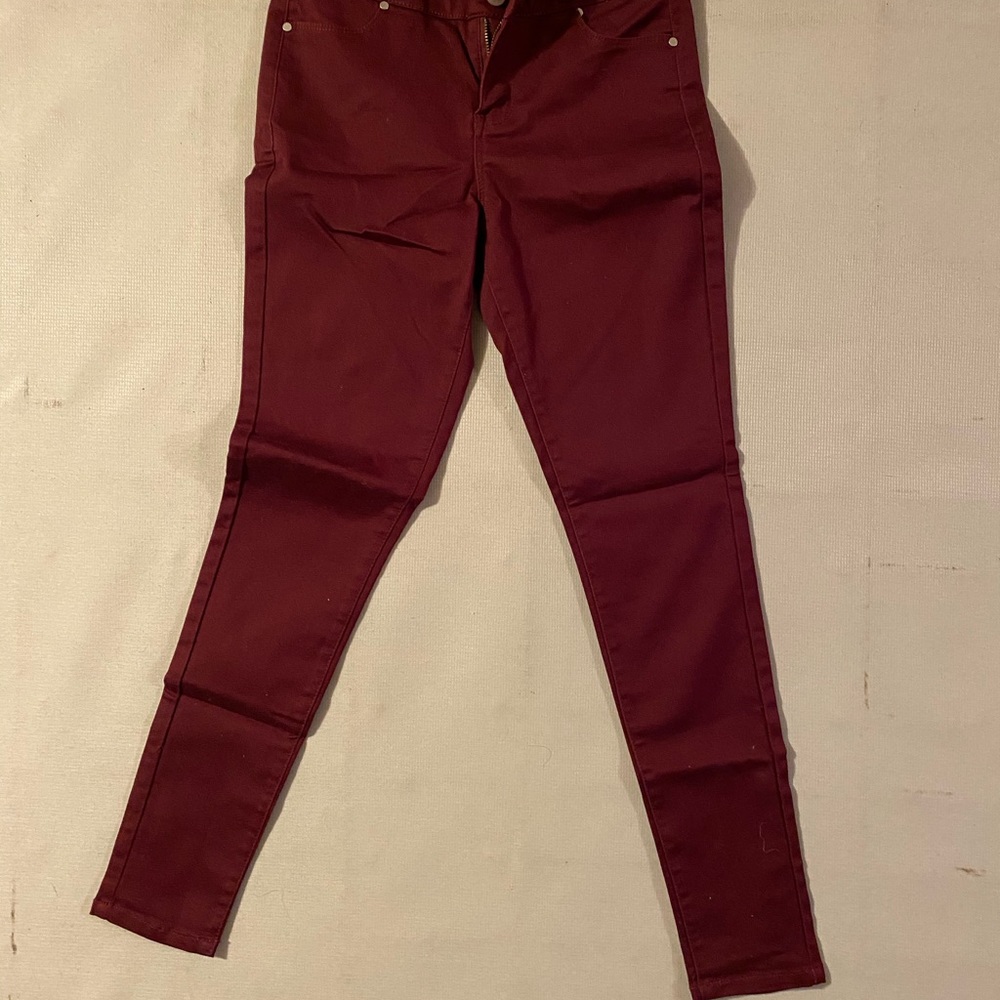 Juniors size 1 burgundy jeans like new.